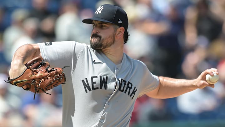 Apr 23, 2025; Cleveland, Ohio, USA; New York Yankees starting pitcher Carlos Rodon (55) throws a pitch during the first inning against the Cleveland Guardians at Progressive Field. 