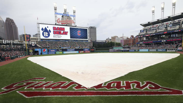 Aug 20, 2022; Cleveland, Ohio, USA; The Cleveland Guardians tarp sits on the field during a rain delay prior to the start against the Chicago White Sox at Progressive Field.