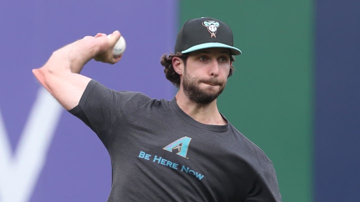 Jul 26, 2025; Pittsburgh, Pennsylvania, USA; Arizona Diamondbacks pitcher Zac Gallen (23) throws in the outfield before the game against the Pittsburgh Pirates at PNC Park. Mandatory Credit: Charles LeClaire-Imagn Images Jul 26, 2025; Pittsburgh, Pennsylvania, USA; Arizona Diamondbacks pitcher Zac Gallen (23) throws in the outfield before the game against the Pittsburgh Pirates at PNC Park. Mandatory Credit: Charles LeClaire-Imagn Images
