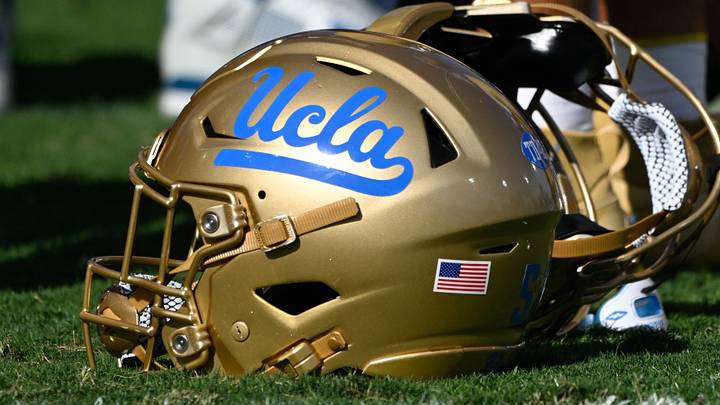 Nov 30, 2024; Pasadena, California, USA; UCLA Bruins helmets during pregame warmups before playing the Fresno State Bulldogs at Rose Bowl. Mandatory Credit: Robert Hanashiro-Imagn Images Nov 30, 2024; Pasadena, California, USA; UCLA Bruins helmets during pregame warmups before playing the Fresno State Bulldogs at Rose Bowl. Mandatory Credit: Robert Hanashiro-Imagn Images