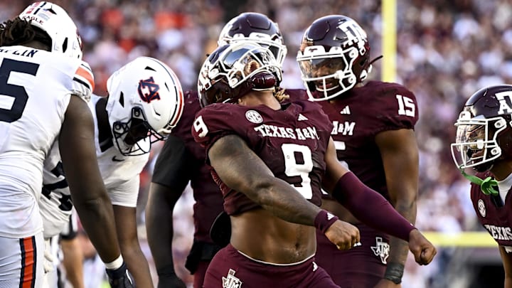 Sep 27, 2025; College Station, Texas, USA; Texas A&M Aggies defensive end Cashius Howell (9) reacts after a sack during the fourth quarter against the Auburn Tigers at Kyle Field. Mandatory Credit: Maria Lysaker-Imagn Images