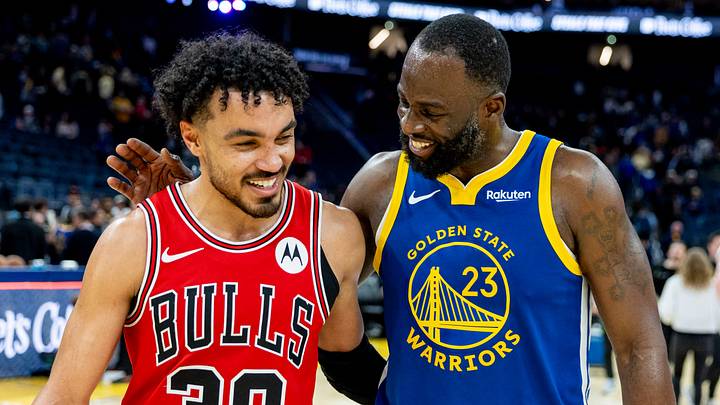 Mar 10, 2026; San Francisco, California, USA; Chicago Bulls guard Tre Jones (30) and Golden State Warriors forward Draymond Green (23) talk after the game at Chase Center. Mandatory Credit: Bob Kupbens-Imagn Images