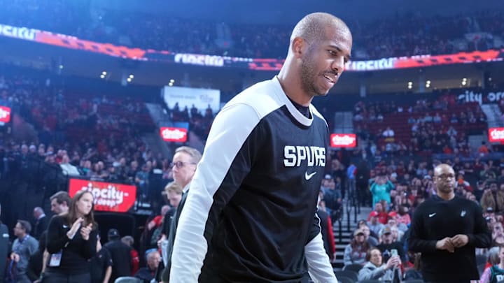 Apr 6, 2025; Portland, Oregon, USA; San Antonio Spurs point guard Chris Paul (3) is introduced before the game against the Portland Trail Blazers at Moda Center.
