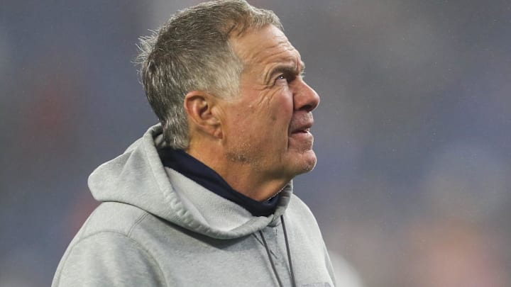 Oct 24, 2022; Foxborough, Massachusetts, USA; New England Patriots head coach Bill Belichick reacts before a game against the Chicago Bears at Gillette Stadium. Mandatory Credit: Paul Rutherford-Imagn Images