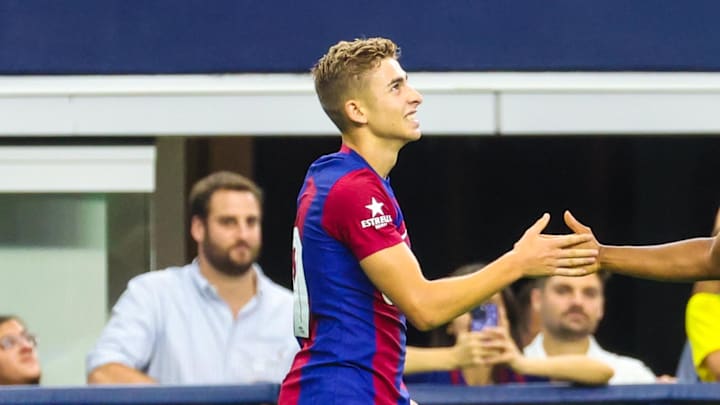 Jul 29, 2023; Arlington, Texas, USA; FC Barcelona midfielder Fermin Lopez Martin (29) celebrates with FC Barcelona forward Ansu Fati (10) after scoring a goal during the second half against Real Madrid at AT&T Stadium. Mandatory Credit: Kevin Jairaj-Imagn Images Jul 29, 2023; Arlington, Texas, USA; FC Barcelona midfielder Fermin Lopez Martin (29) celebrates with FC Barcelona forward Ansu Fati (10) after scoring a goal during the second half against Real Madrid at AT&T Stadium. Mandatory Credit: Kevin Jairaj-Imagn Images