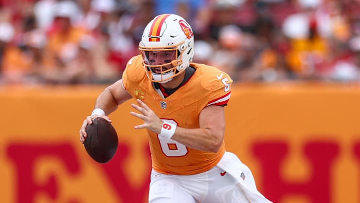 Tampa Bay Buccaneers quarterback Baker Mayfield (6) runs with the ball against the Atlanta Falcons in the fourth quarter. Tampa Bay Buccaneers quarterback Baker Mayfield (6) runs with the ball against the Atlanta Falcons in the fourth quarter.