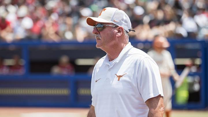Texas Longhorns head coach Mike White looks across the field in the first inning against the Oklahoma Sooners. Texas Longhorns head coach Mike White looks across the field in the first inning against the Oklahoma Sooners.
