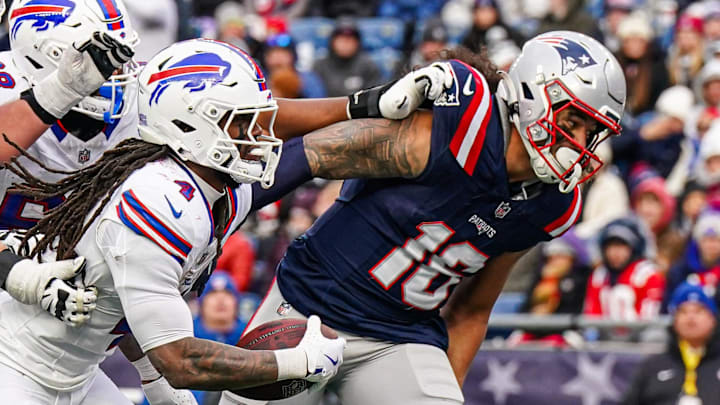 Buffalo Bills running back James Cook scores against the New England Patriots. Buffalo Bills running back James Cook scores against the New England Patriots.