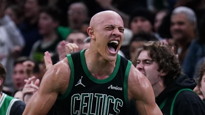 Nov 26, 2025; Boston, Massachusetts, USA; Boston Celtics guard Jordan Walsh (27) and Detroit Pistons guard Cade Cunningham (2) react after an out of bound ball called in the Celtics favor in the last seconds of the fourth quarter at TD Garden. Mandatory Credit: David Butler II-Imagn Images