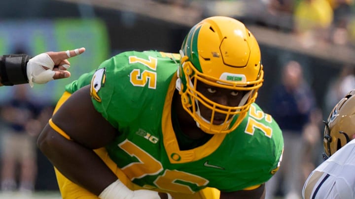 Oregon offensive linemen Iapani Laloulu, left, and Emmanuel Pregnon line up as the Oregon Ducks host the Montana State Bobcats on Aug. 30, 2025, at Autzen Stadium in Eugene, Oregon.