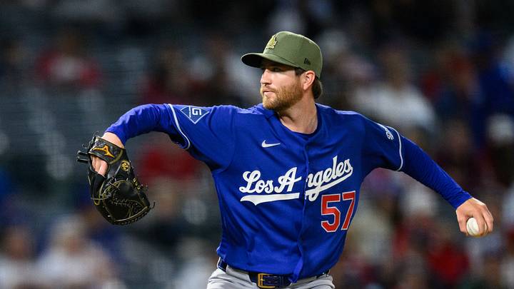 Dodgers pitcher Charlie Barnes (57) delivers during the ninth inning against the Los Angeles Angels at Angel Stadium on May 15. Dodgers pitcher Charlie Barnes (57) delivers during the ninth inning against the Los Angeles Angels at Angel Stadium on May 15.