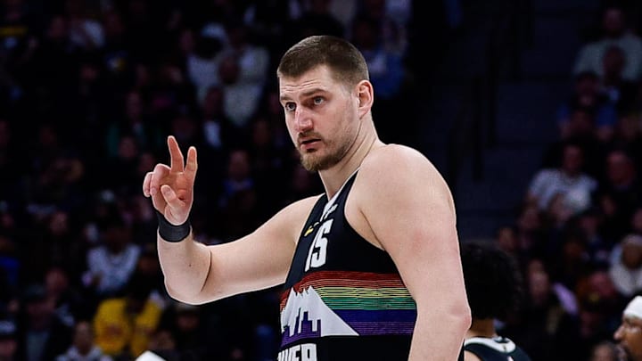 Feb 11, 2026; Denver, Colorado, USA; Denver Nuggets center Nikola Jokic (15) gestures in the fourth quarter against the Memphis Grizzlies at Ball Arena.
