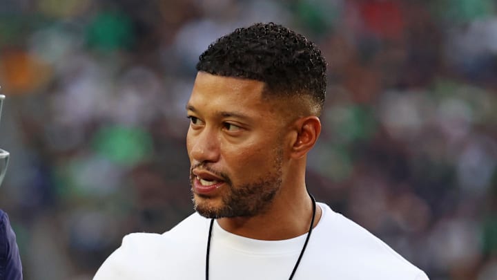 Sep 13, 2025; South Bend, Indiana, USA; Notre Dame Fighting Irish head coach Marcus Freeman reacts with Notre Dame Fighting Irish quarterback Blake Hebert (12) during the first half against the Texas A&M Aggies at Notre Dame Stadium.