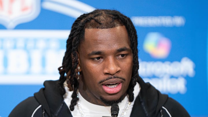 Washington running back Jonah Coleman speaks to members of the media