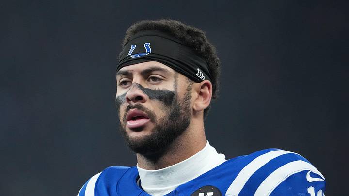 Former Indianapolis Colts wide receiver Michael Pittman Jr. watches from the sidelines