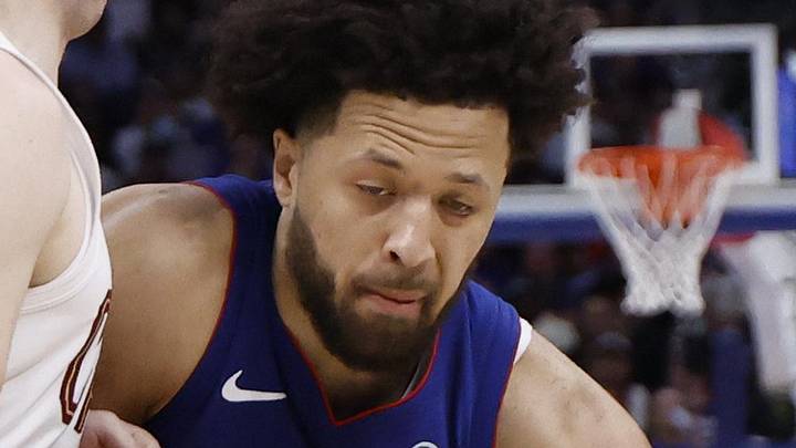 Detroit Pistons guard Cade Cunningham (2) dribbles against Cleveland Cavaliers guard Sam Merrill (5) in the second half during game seven of the second round of the 2026 NBA Playoffs at Little Caesars Arena on May 17, 2026.
