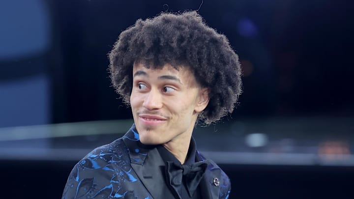 Jun 25, 2025; Brooklyn, NY, USA; Nolan Traore reacts after being selected as the 19th pick by the Brooklyn Nets in the first round of the 2025 NBA Draft at Barclays Center. Mandatory Credit: Brad Penner-Imagn Images Jun 25, 2025; Brooklyn, NY, USA; Nolan Traore reacts after being selected as the 19th pick by the Brooklyn Nets in the first round of the 2025 NBA Draft at Barclays Center. Mandatory Credit: Brad Penner-Imagn Images