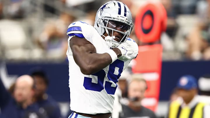 Sep 14, 2025; Arlington, Texas, USA; Dallas Cowboys linebacker Kenneth Murray Jr. (59) reacts after a play against the New York Giants during the second quarter at AT&T Stadium. 