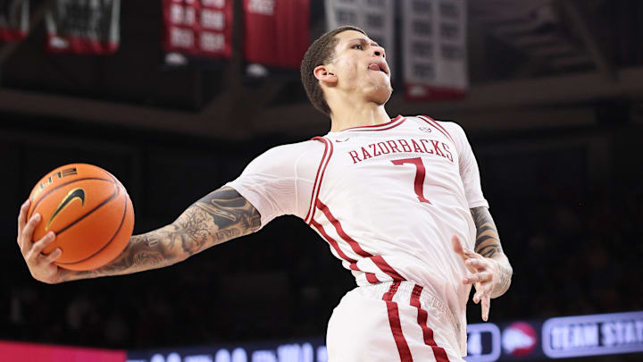 Arkansas Razorbacks forward Trevon Brazile (7) goes up for a dunk during the first half against the Texas Longhorns at Bud Walton Arena.