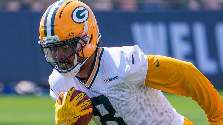 Green Bay Packers running back Josh Jacobs (8) runs through a drill at training camp.