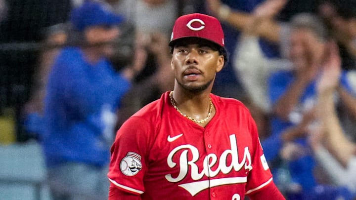 Cincinnati Reds starting pitcher Hunter Greene (21) reacts as Los Angeles Dodgers right fielder Teoscar Hernandez (37) runs the bases on a three-run home run in the third inning of the MLB National League Wild Card Game 1 between the Los Angeles Dodgers and the Cincinnati Reds at Dodger Stadium in Los Angeles on Tuesday, Sept. 30, 2025. The Dodgers won game 1 of the series, 10-5.