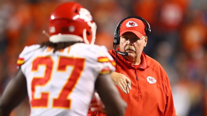 Oct 1, 2018; Denver, CO, USA; Kansas City Chiefs head coach Andy Reid and running back Kareem Hunt (27) against the Denver Broncos at Broncos Stadium at Mile High. Mandatory Credit: Mark J. Rebilas-Imagn Images
