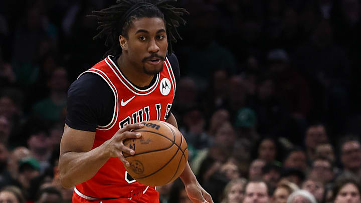 Feb 11, 2026; Boston, Massachusetts, USA; Chicago Bulls guard Jaden Ivey (31) brings the ball up the court against the Boston Celtics during the second half at TD Garden.