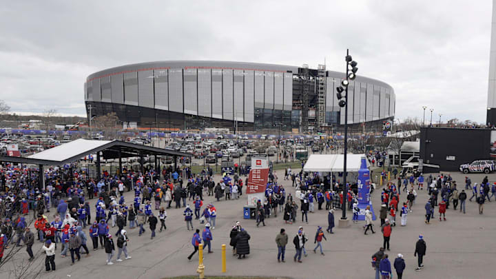 Fans enter Highmark Stadium before the start of the Bills home game against the Tampa Bay Buccaneers on Nov 16, 2025 in Orchard Park. In the background is the new stadium. Fans enter Highmark Stadium before the start of the Bills home game against the Tampa Bay Buccaneers on Nov 16, 2025 in Orchard Park. In the background is the new stadium.