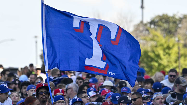 Nov 3, 2023; Arlington, TX, USA; A view of the Texas Rangers fans and flags during the World Series championship parade at Globe Life Field. Mandatory Credit: Jerome Miron-Imagn Images