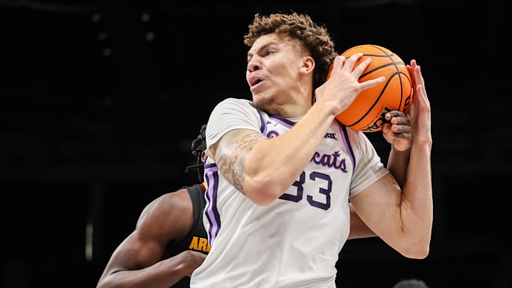 Mar 11, 2025; Kansas City, MO, USA; Kansas State Wildcats guard Coleman Hawkins (33) drives to the basket during the first half against the Arizona State Sun Devils at T-Mobile Center. Mandatory Credit: William Purnell-Imagn Images Mar 11, 2025; Kansas City, MO, USA; Kansas State Wildcats guard Coleman Hawkins (33) drives to the basket during the first half against the Arizona State Sun Devils at T-Mobile Center. Mandatory Credit: William Purnell-Imagn Images