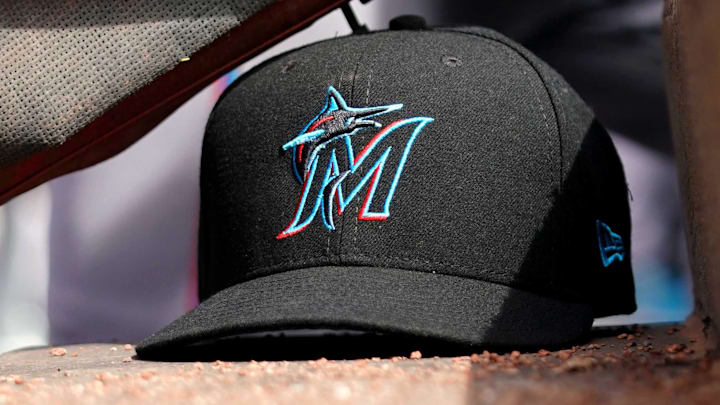 Apr 11, 2019; Cincinnati, OH, USA; A view of a New Era Miami Marlins hat in the dugout during the game against the Cincinnati Reds at Great American Ball Park.