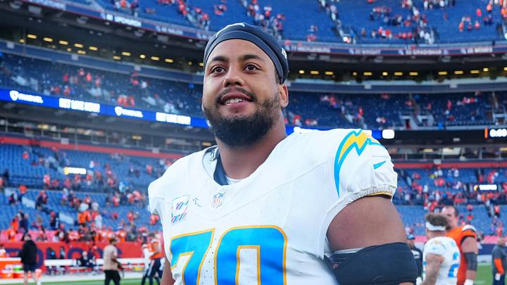 Oct 13, 2024; Denver, Colorado, USA; Los Angeles Chargers offensive tackle Rashawn Slater (70) following the win over the Denver Broncos at Empower Field at Mile High. Mandatory Credit: Ron Chenoy-Imagn Images Oct 13, 2024; Denver, Colorado, USA; Los Angeles Chargers offensive tackle Rashawn Slater (70) following the win over the Denver Broncos at Empower Field at Mile High. Mandatory Credit: Ron Chenoy-Imagn Images