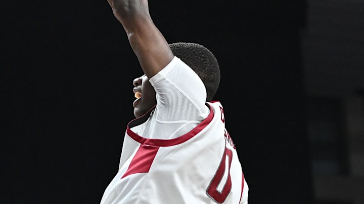 Nov 21, 2024; Spokane, Washington, USA; Washington State Cougars guard Cedric Coward (0) dunks the ball against the Eastern Washington Eagles in the second half at Spokane Veterans Memorial Arena. Washington State Cougars won 96-81. Mandatory Credit: James Snook-Imagn Images