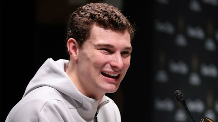 Jan 17, 2026; Miami Gardens, FL, USA; (Editors Note: Caption Correction) Indiana Hoosiers quarterback Fernando Mendoza (16) talks to the media during media day for the 2025 College Football Playoff National Championship at Miami Beach Convention Center. Mandatory Credit: Sam Navarro-Imagn Images