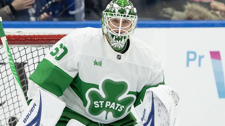 Mar 17, 2026; Toronto, Ontario, CAN; Toronto Maple Leafs goaltender Joseph Woll (60) takes pucks during the warmup before a game against the New York Islanders at Scotiabank Arena. Mandatory Credit: Nick Turchiaro-Imagn Images