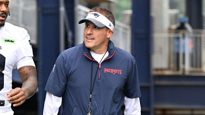 Jun 9, 2025; Foxborough, MA, USA; New England Patriots wide receiver Stefon Diggs (8) and offensive coordinator Josh McDaniels walk to the practice fields at Gillette Stadium. Mandatory Credit: Eric Canha-Imagn Images
