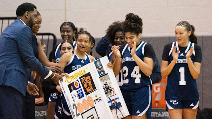 Feb 14, 2025; Randolph, NJ, USA; Morris Catholic vs. Morristown in the Morris County Tournament girls basketball semifinals at County College of Morris. MC #3 Mia Pauldo celebrates scoring her 2000th point. Feb 14, 2025; Randolph, NJ, USA; Morris Catholic vs. Morristown in the Morris County Tournament girls basketball semifinals at County College of Morris. MC #3 Mia Pauldo celebrates scoring her 2000th point.