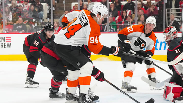 May 4, 2026; Raleigh, North Carolina, USA; Philadelphia Flyers right wing Porter Martone (94) gets the shot on against Carolina Hurricanes goaltender Frederik Andersen (31) during the second period in game two of the second round of the 2026 Stanley Cup Playoffs at Lenovo Center. Mandatory Credit: James Guillory-Imagn Images