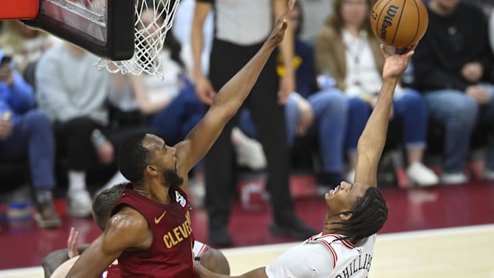 Apr 8, 2025; Cleveland, Ohio, USA; Chicago Bulls forward Julian Phillips (15) shoots beside Cleveland Cavaliers forward Evan Mobley (4) in the third quarter at Rocket Arena. Mandatory Credit: David Richard-Imagn Images Apr 8, 2025; Cleveland, Ohio, USA; Chicago Bulls forward Julian Phillips (15) shoots beside Cleveland Cavaliers forward Evan Mobley (4) in the third quarter at Rocket Arena. Mandatory Credit: David Richard-Imagn Images