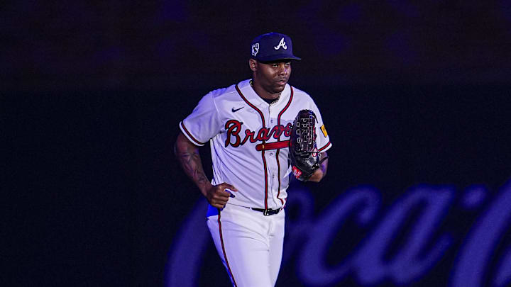 Apr 15, 2026; Cumberland, Georgia, USA; Atlanta Braves pitcher Raisel Iglesias (26) enters the game to pitch against the Miami Marlins during the ninth inning at Truist Park. All players are wearing number 42 today in honor of Jackie Robinson. Mandatory Credit: Dale Zanine-Imagn Images