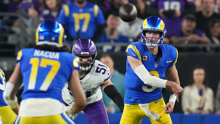Los Angeles Rams quarterback Matthew Stafford (9) throws the ball to receiver Puka Nacua (17) against the Minnesota Vikings during their playoff game at State Farm Stadium on Jan. 13, 2025, in Glendale. Los Angeles Rams quarterback Matthew Stafford (9) throws the ball to receiver Puka Nacua (17) against the Minnesota Vikings during their playoff game at State Farm Stadium on Jan. 13, 2025, in Glendale.