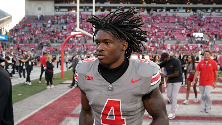 Oct 5, 2024; Columbus, OH, USA; Ohio State Buckeyes wide receiver Jeremiah Smith (4) runs off the field after beating Iowa Hawkeyes after the NCAA football game at Ohio Stadium. Oct 5, 2024; Columbus, OH, USA; Ohio State Buckeyes wide receiver Jeremiah Smith (4) runs off the field after beating Iowa Hawkeyes after the NCAA football game at Ohio Stadium.