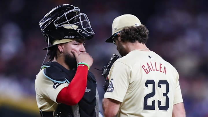Arizona Diamondbacks pitcher Zac Gallen (23) meets on the mound with catcher Jose Herrera (11) on Aug. 30, 2024 at Chase Field in Phoenix. Arizona Diamondbacks pitcher Zac Gallen (23) meets on the mound with catcher Jose Herrera (11) on Aug. 30, 2024 at Chase Field in Phoenix.
