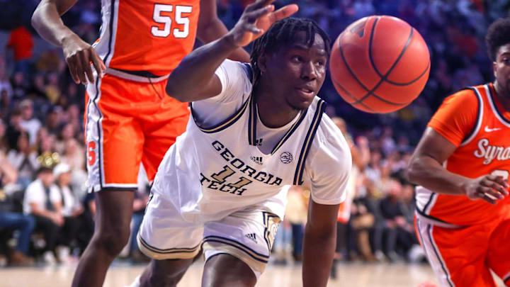 Feb 17, 2024; Atlanta, Georgia, USA; Georgia Tech Yellow Jackets forward Baye Ndongo (11) reaches for the ball against the Syracuse Orange in the second half at McCamish Pavilion. Mandatory Credit: Brett Davis-Imagn Images
