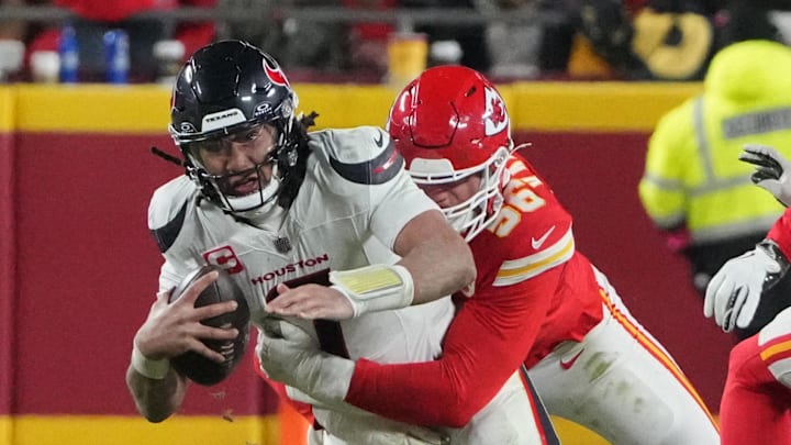 Jan 18, 2025; Kansas City, Missouri, USA; Houston Texans quarterback C.J. Stroud (7) is sacked by Kansas City Chiefs defensive end George Karlaftis (56) during the fourth quarter of a 2025 AFC divisional round game at GEHA Field at Arrowhead Stadium. Mandatory Credit: Denny Medley-Imagn Images Jan 18, 2025; Kansas City, Missouri, USA; Houston Texans quarterback C.J. Stroud (7) is sacked by Kansas City Chiefs defensive end George Karlaftis (56) during the fourth quarter of a 2025 AFC divisional round game at GEHA Field at Arrowhead Stadium. Mandatory Credit: Denny Medley-Imagn Images
