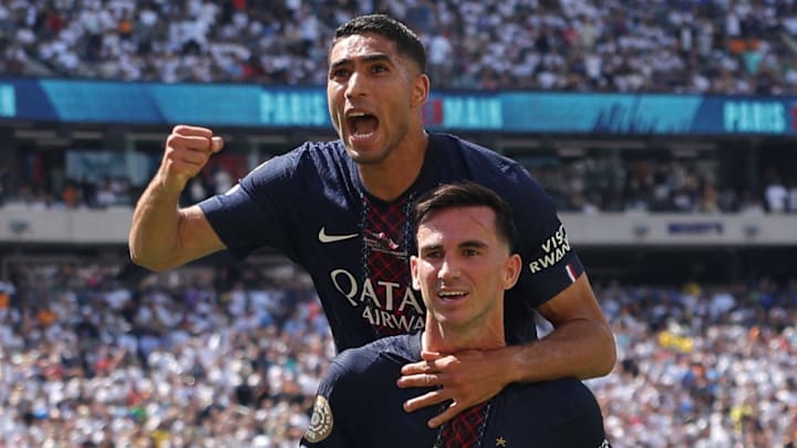 Achraf Hakimi and Fabian Ruiz celebrate as PSG book their spot in the Club World Cup final.