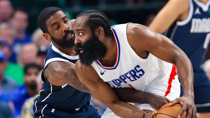 Apr 28, 2024; Dallas, Texas, USA;  LA Clippers guard James Harden (1) controls the ball as Dallas Mavericks guard Kyrie Irving (11) defends during the first half during game four of the first round for the 2024 NBA playoffs at American Airlines Center. Mandatory Credit: Kevin Jairaj-Imagn Images