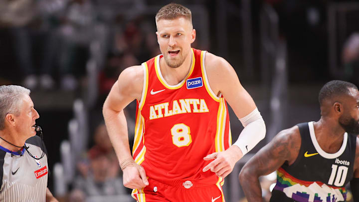 Dec 5, 2025; Atlanta, Georgia, USA; Atlanta Hawks center Kristaps Porzingis (8) reacts after a basket against the Denver Nuggets in the third quarter at State Farm Arena. Mandatory Credit: Brett Davis-Imagn Images
