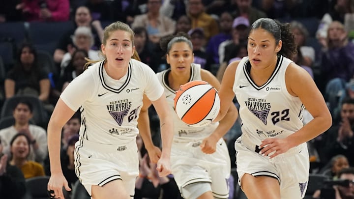 May 21, 2025; San Francisco, California, USA;  Golden State Valkyries guard Veronica Burton (22) dribbles up court with guard Kate Martin (20) during a game against Washington Mystics in the first quarter at Chase Center. Mandatory Credit: David Gonzales-Imagn Images
