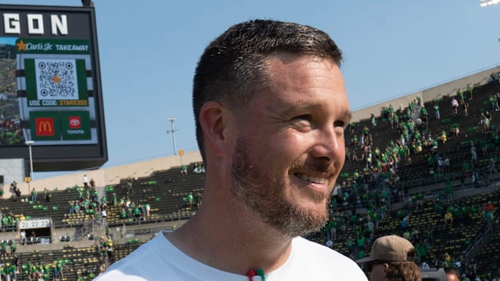 Oregon Head Coach Dan Lanning leaves the field after the win over Oklahoma State at Autzen.